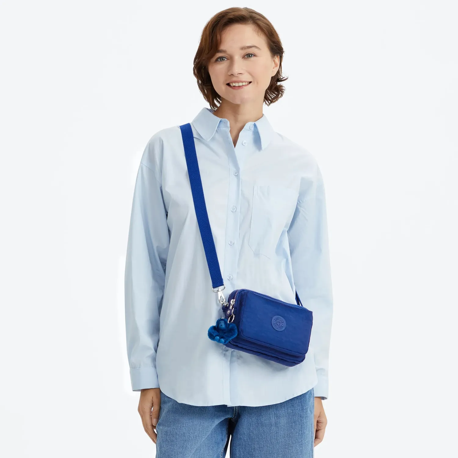 Kipling Abanu Multi tasje Klein Blazing Blue verstelbare riem