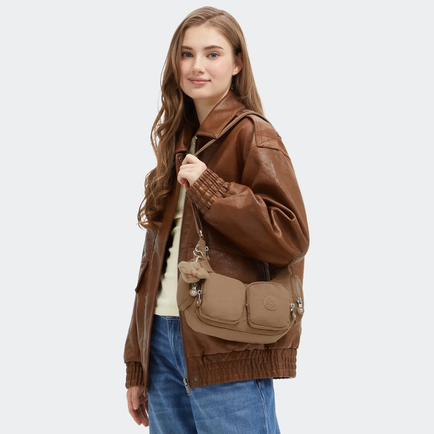 Kipling Rikka S crossbodytas Klein Early Tan ritsvakken