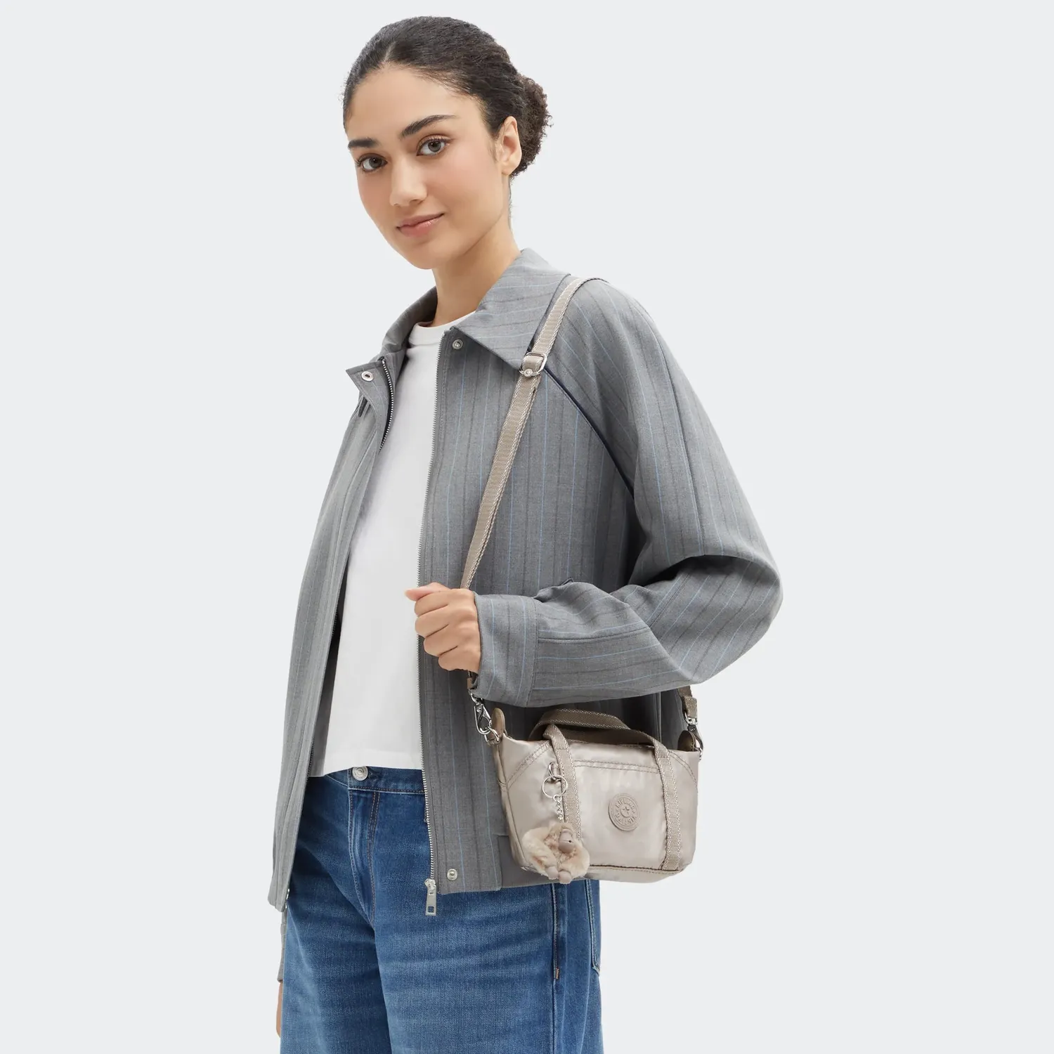 Kipling Art Compact schoudertas metallic glow klein gevoerd