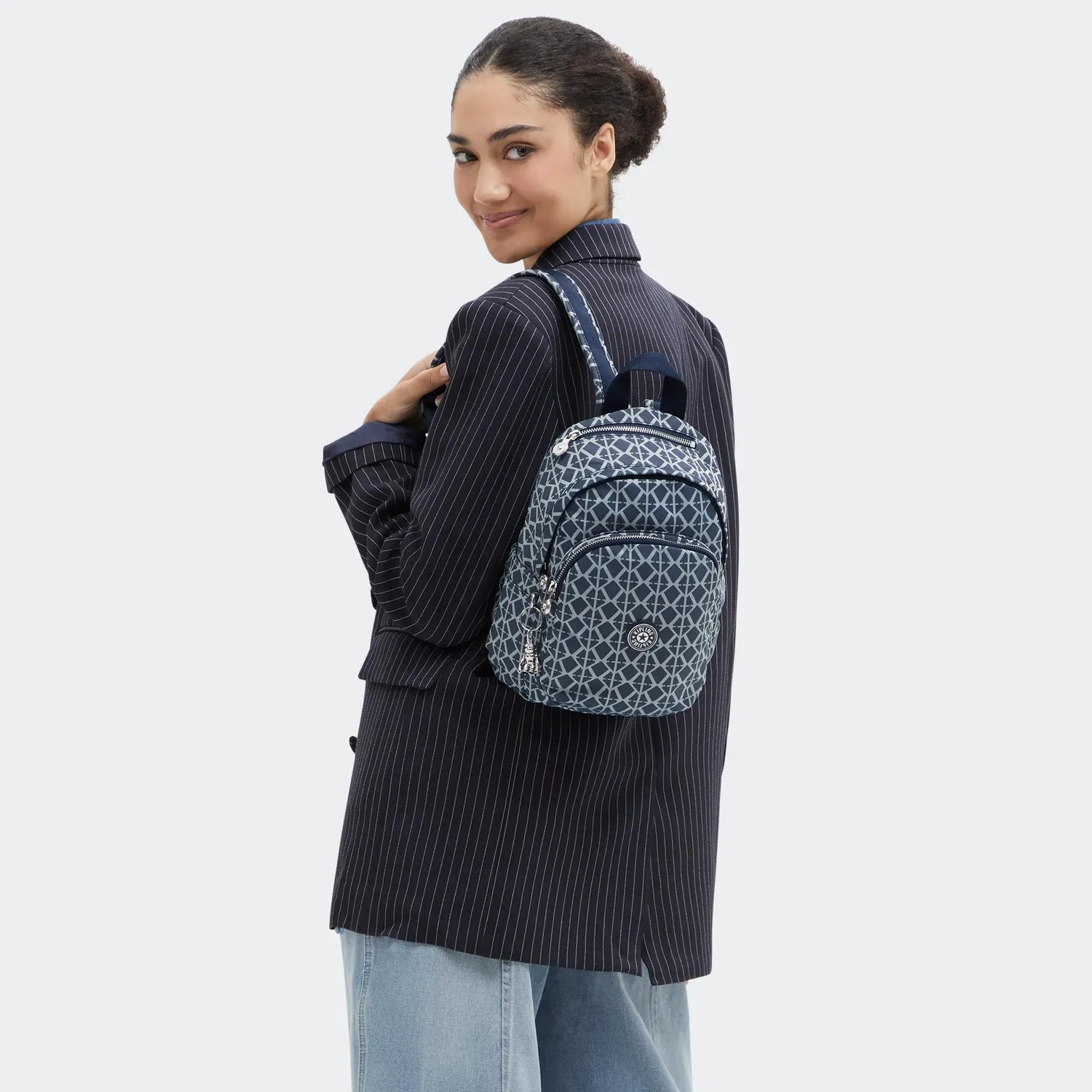 Kipling Delia Mini rugzak Navy Sign Jacquard klein vakken