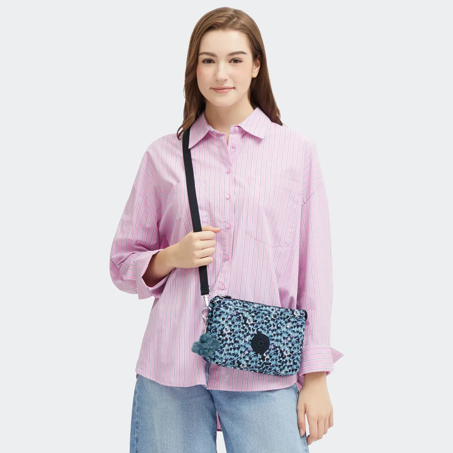 Kipling Riri crossbodytas Klein Rainy Feathers waterafstotend