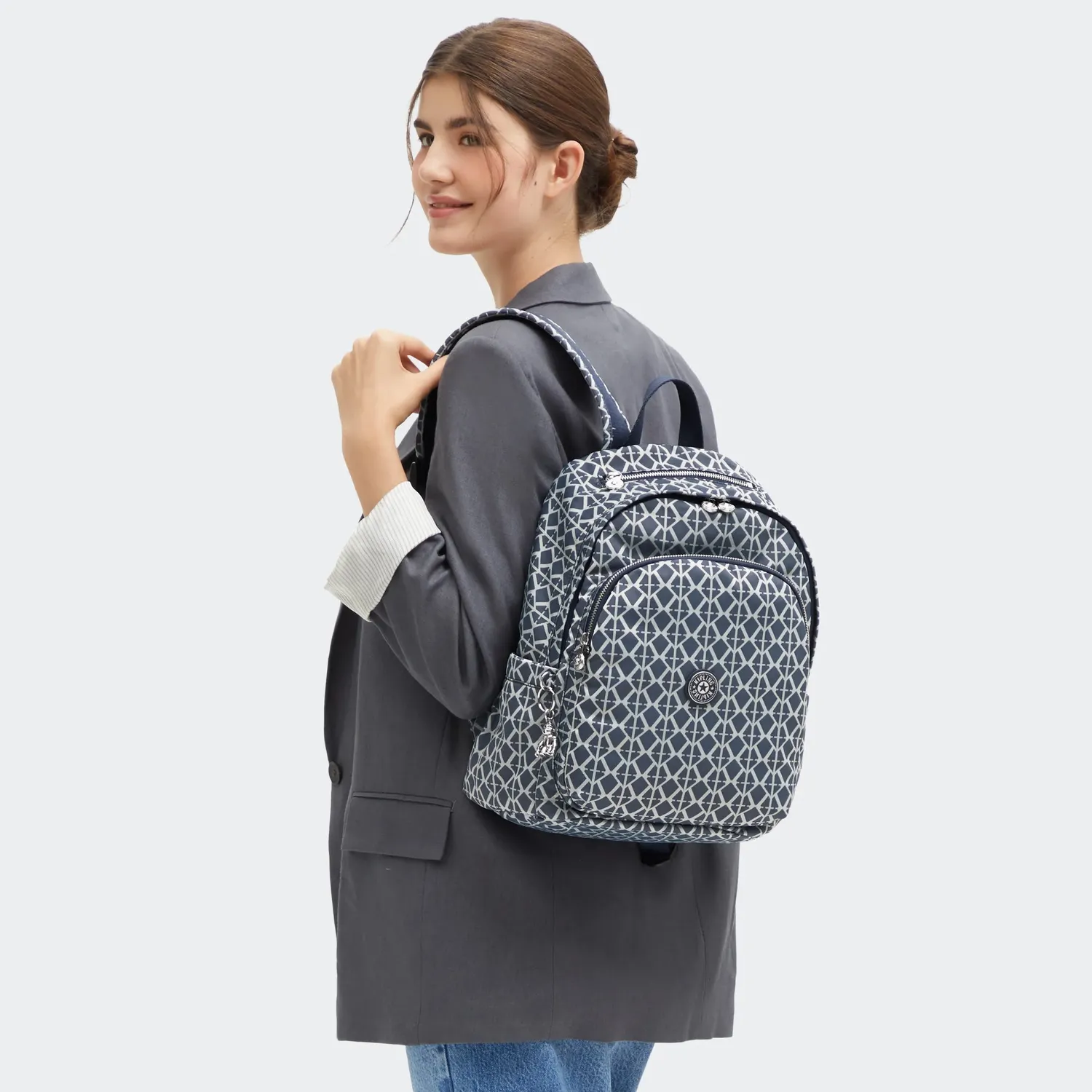 Kipling Delia rugzak Medium Navy Sign Jacquard ritsvakken