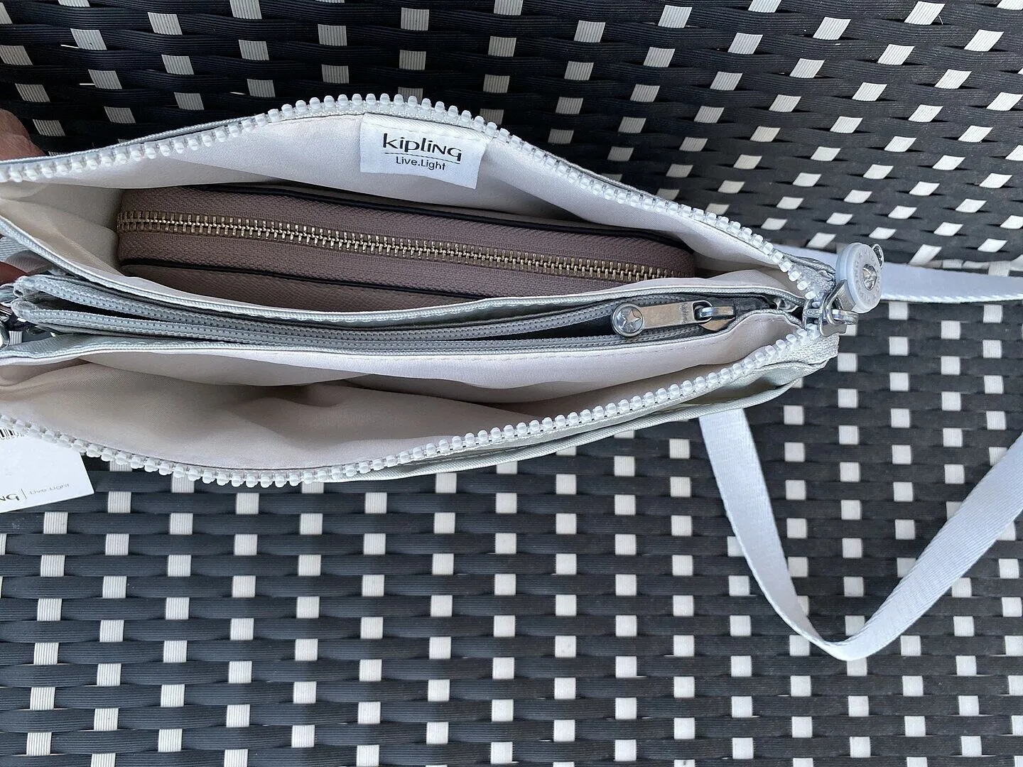 Kipling Riri crossbodytas klein Lounge Wine waterafstotend