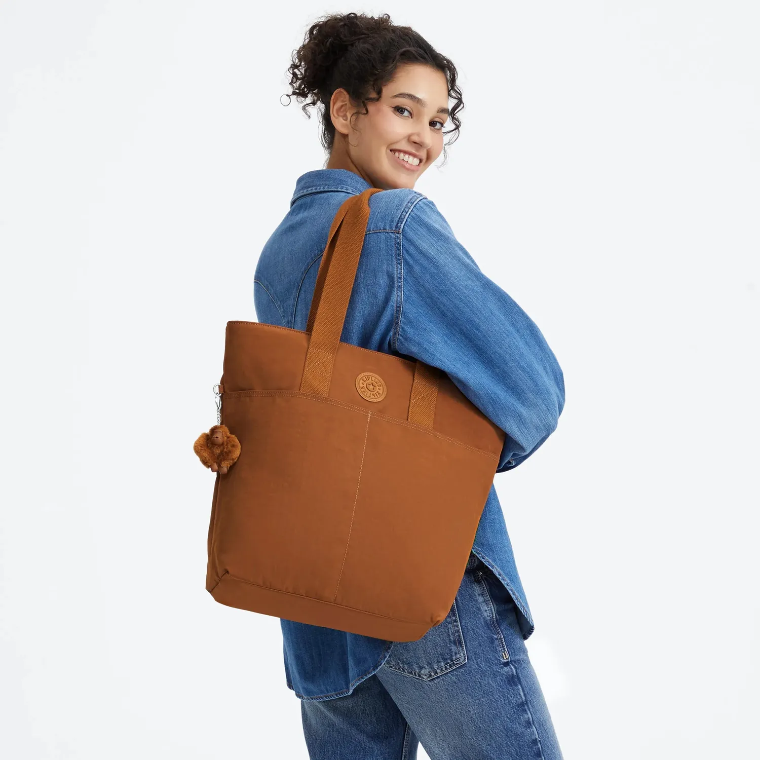 Kipling Hanifa schoudertas Groot Stylish Mokka laptopvak