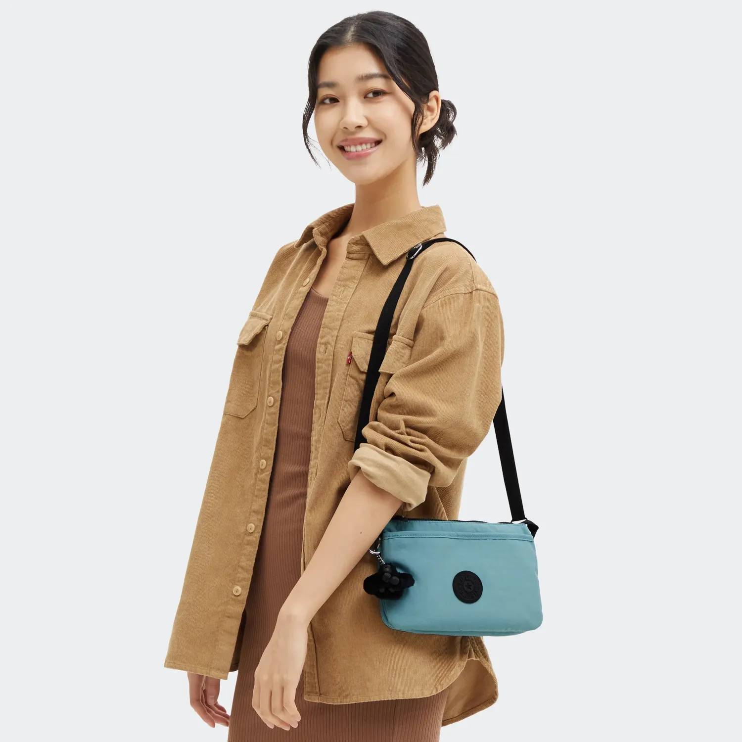 Kipling Riri crossbodytas klein muted sage waterafstotend