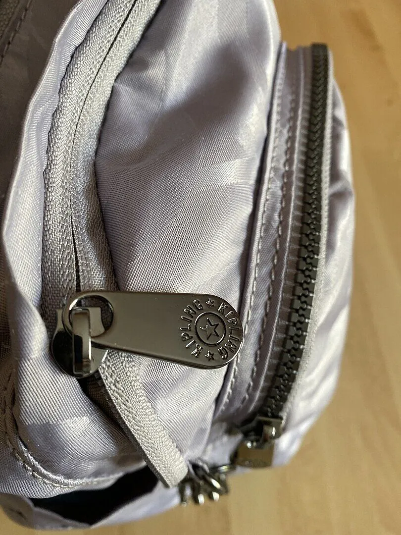 Kipling Delia Mini rugzak Navy Sign Jacquard klein vakken