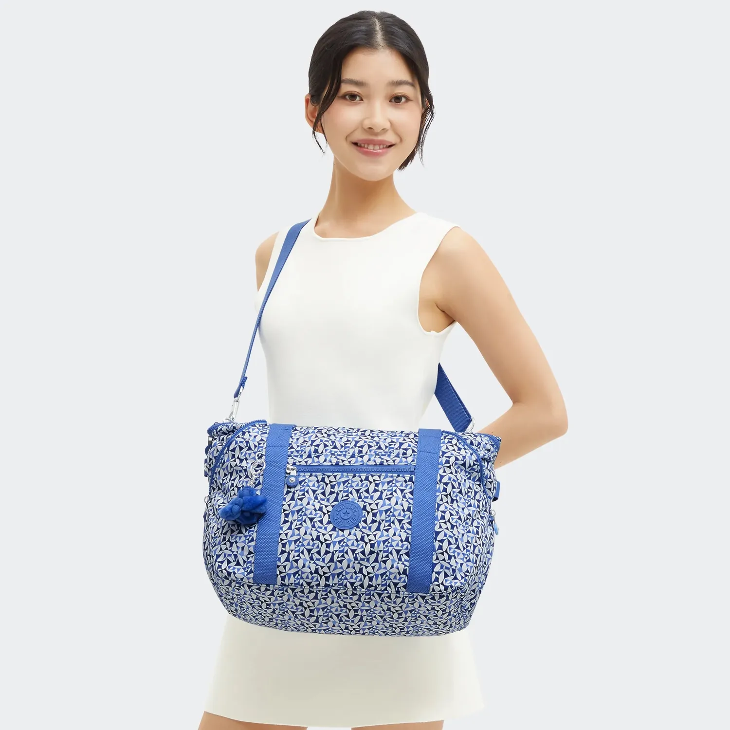 Kipling Art schoudertas Medium Crazy Leaves licht