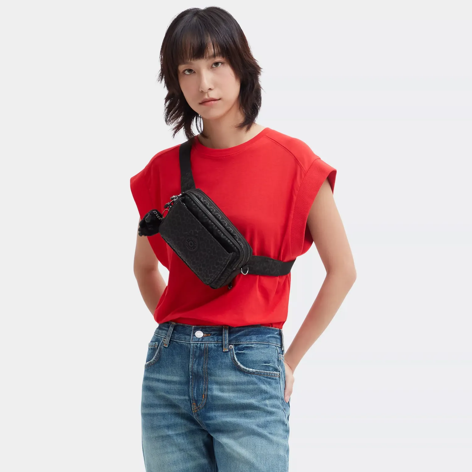 Kipling Abanu Multi crossbody tas Klein Signature Emb patroon