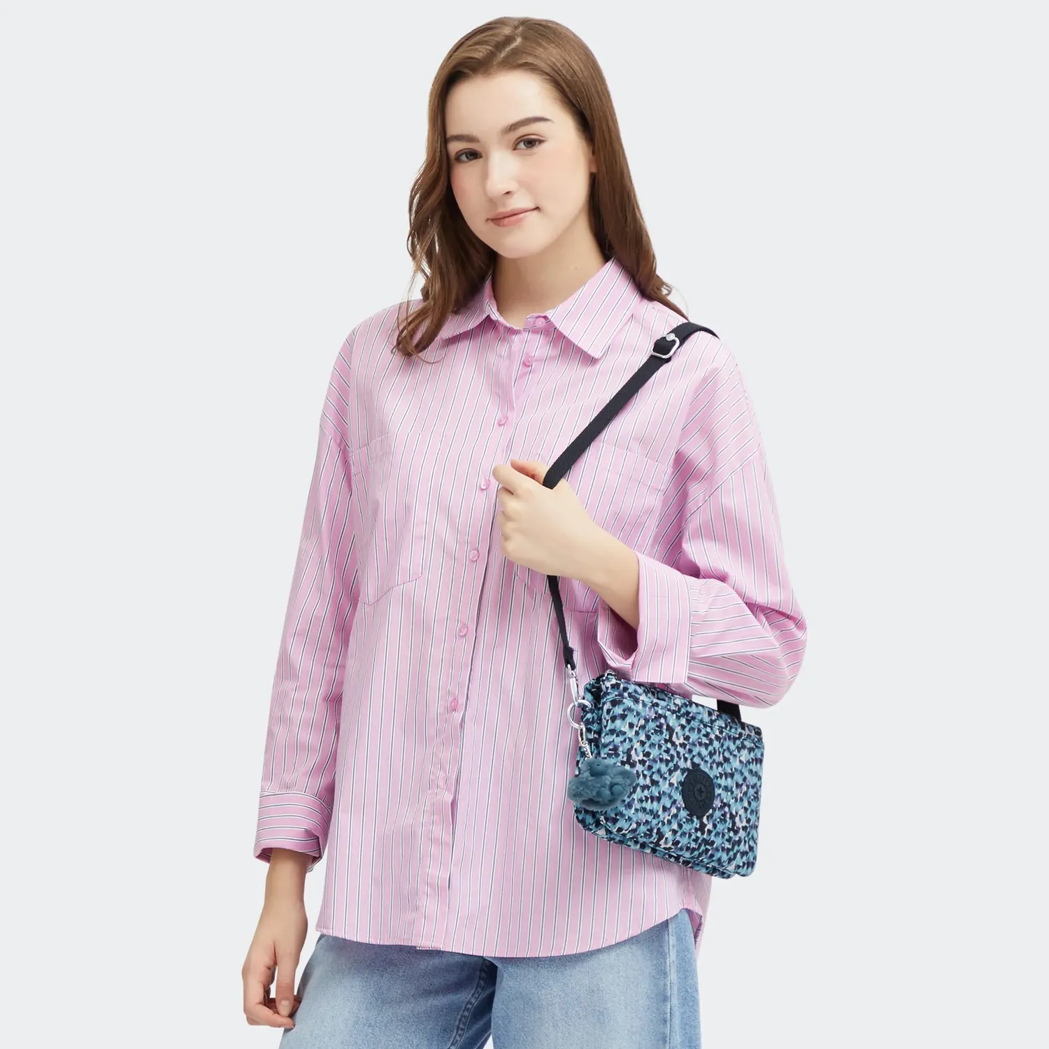 Kipling Riri crossbodytas Klein Rainy Feathers waterafstotend