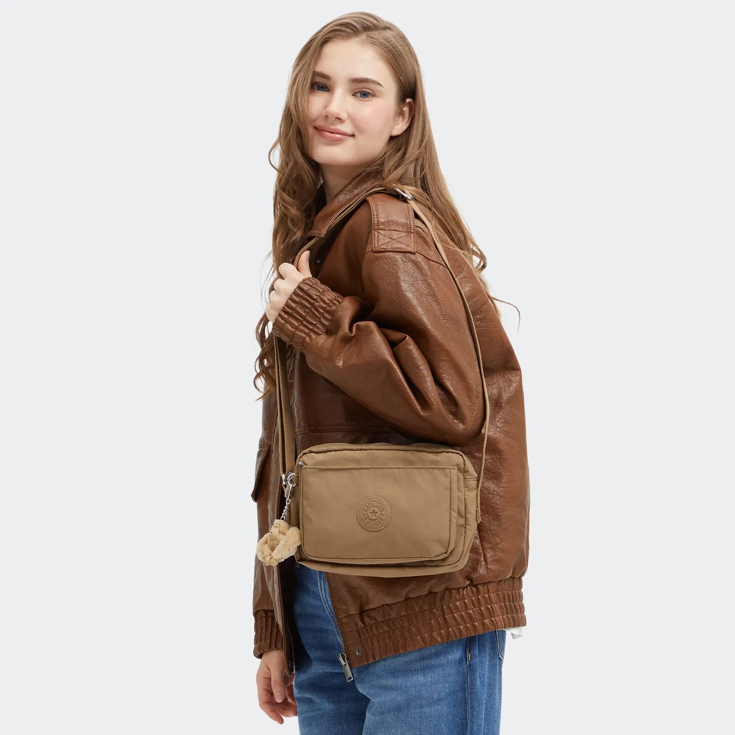 Kipling Abanu M crossbody Early Tan met 2 ritsvakken