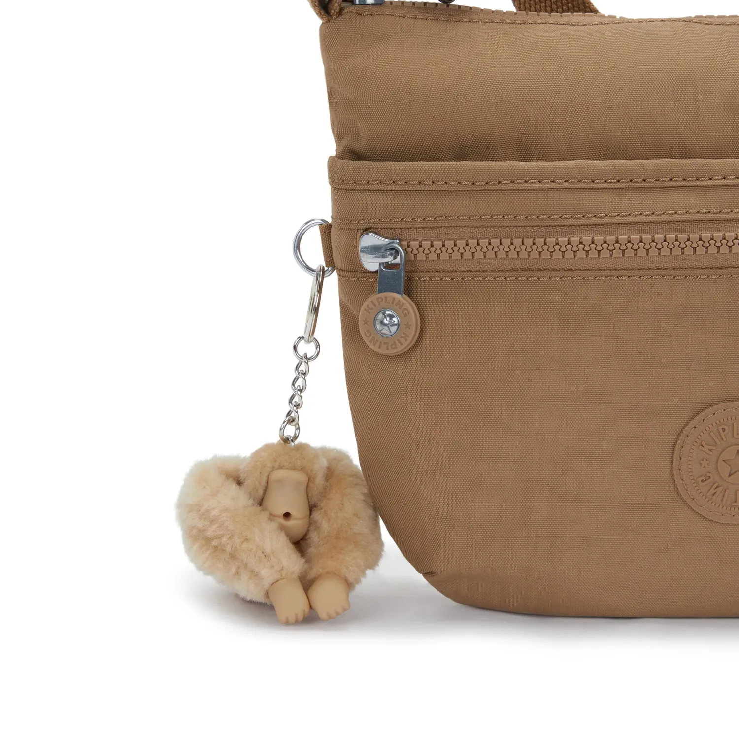 Kipling Arto S schoudertas Early Tan klein licht