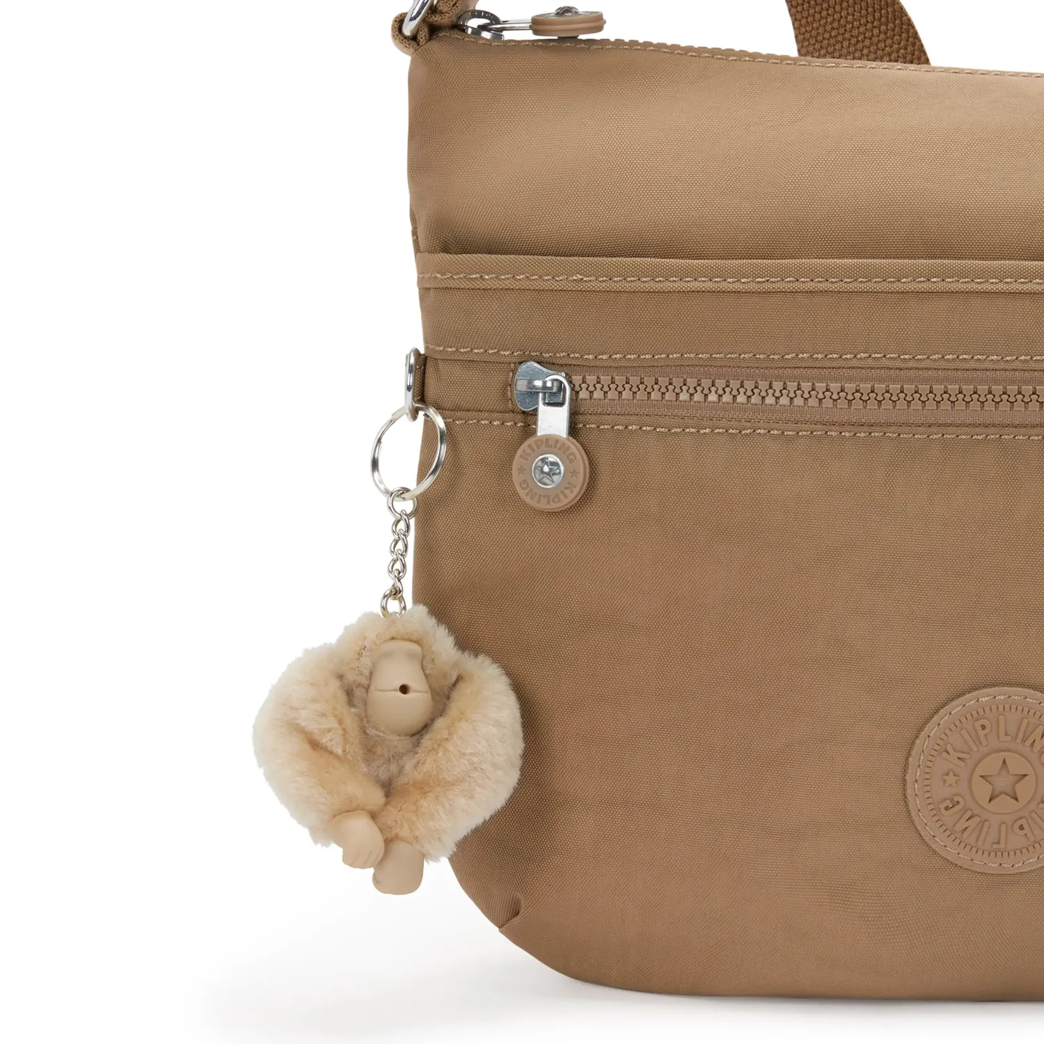 Kipling Arto schoudertas Medium Early Tan waterafstotend
