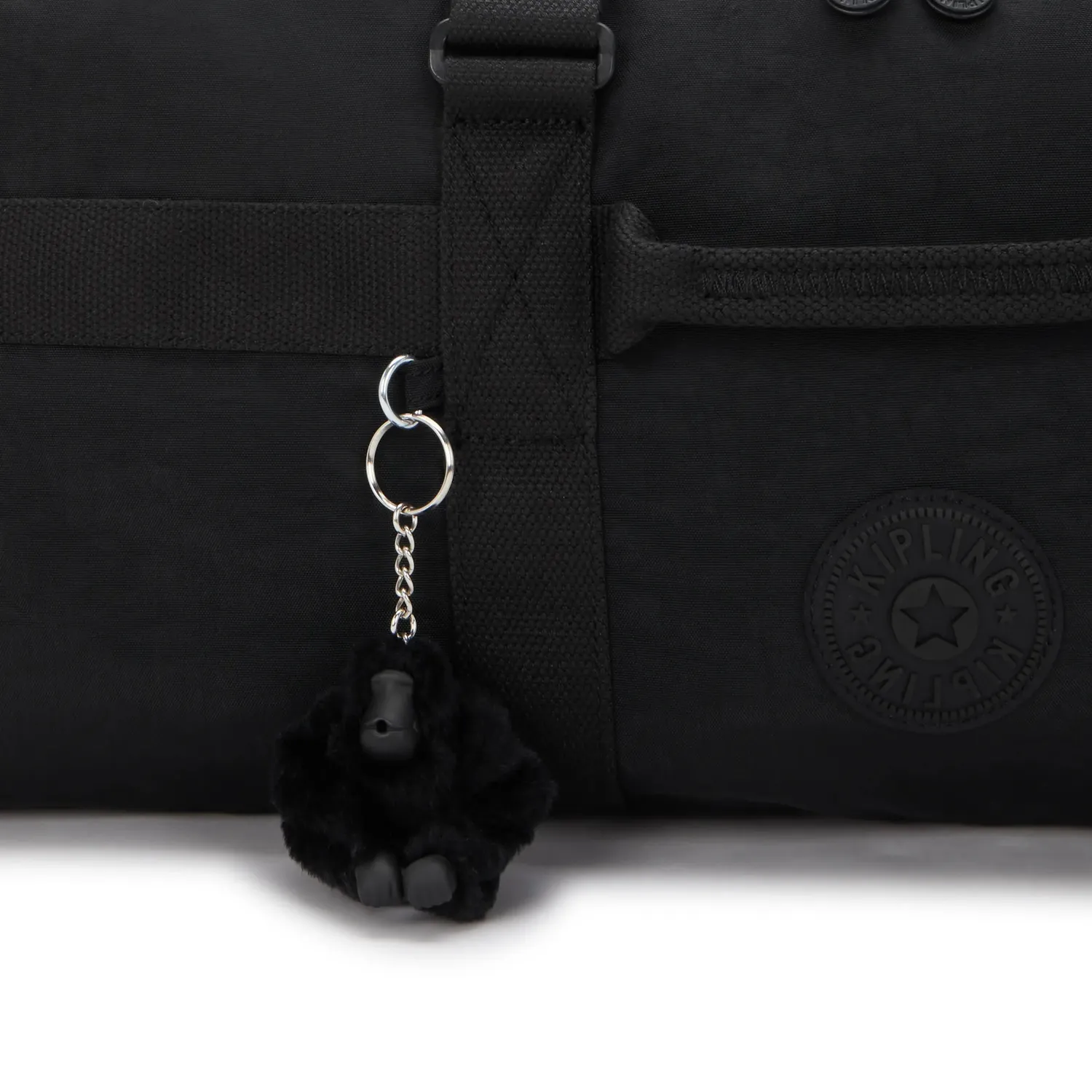 Kipling Jonis M Up reistas Medium Black Noir laptopvak