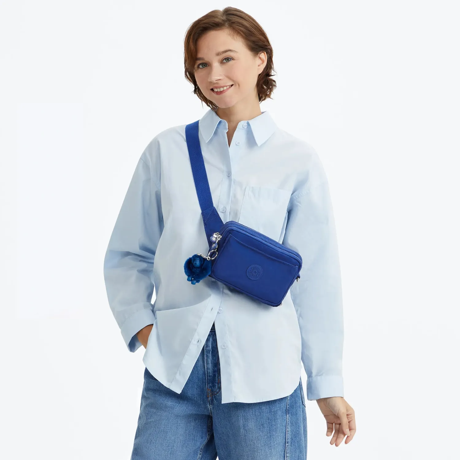 Kipling Abanu Multi tasje Klein Blazing Blue verstelbare riem