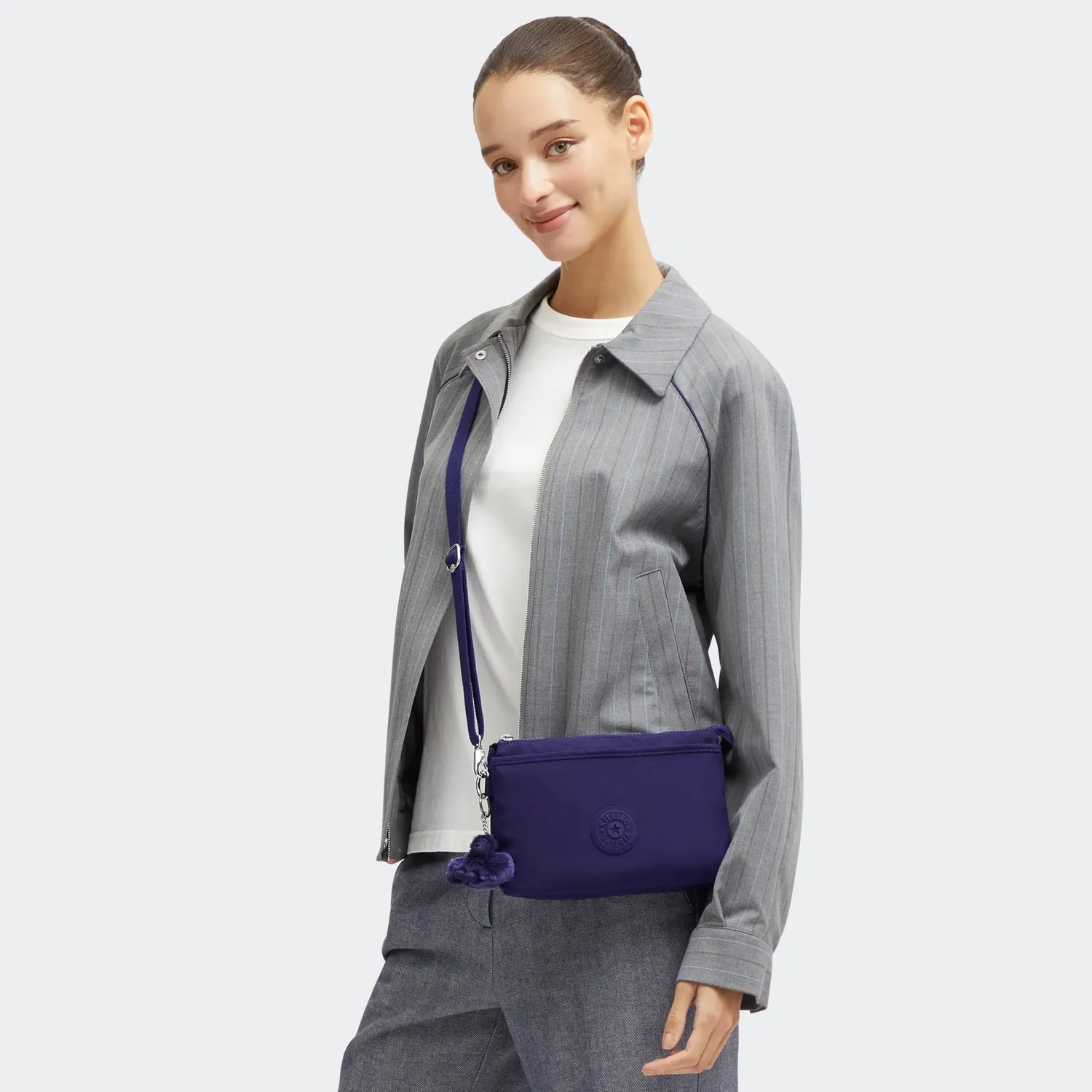 Kipling Riri crossbodytas Klein Moonlit Blue waterafstotend