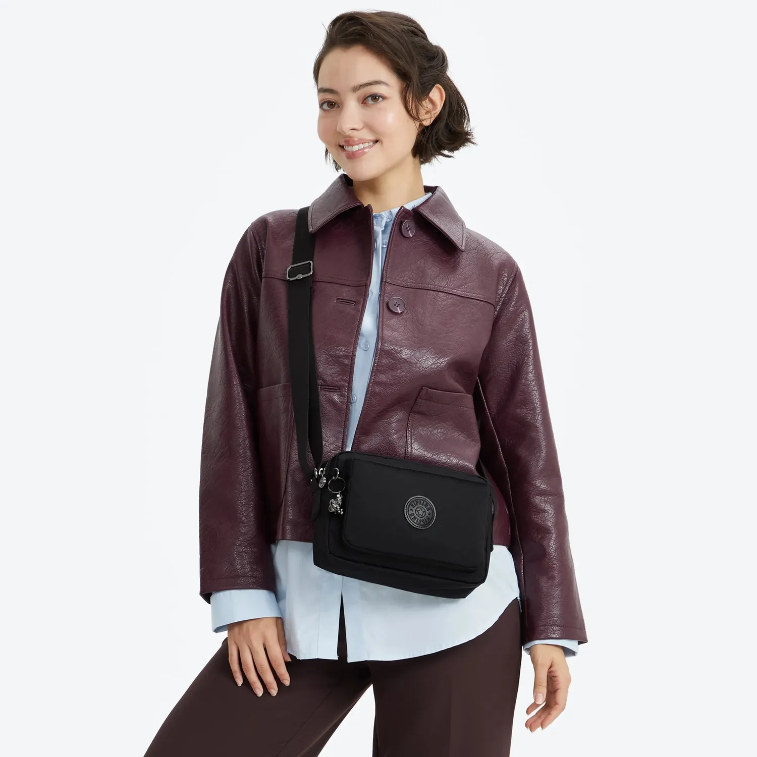 Kipling Abanu M crossbody tas Infinite Black medium met ritsvakken