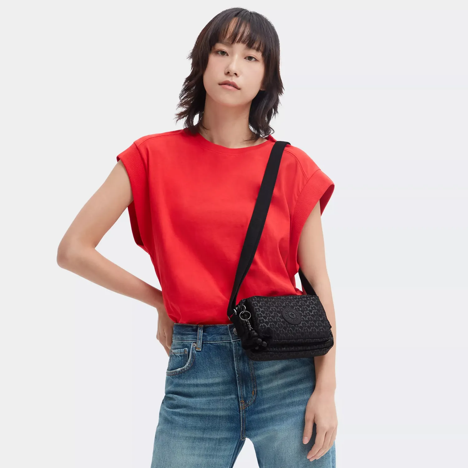 Kipling Abanu crossbody tas klein Signature Emb bedrukt