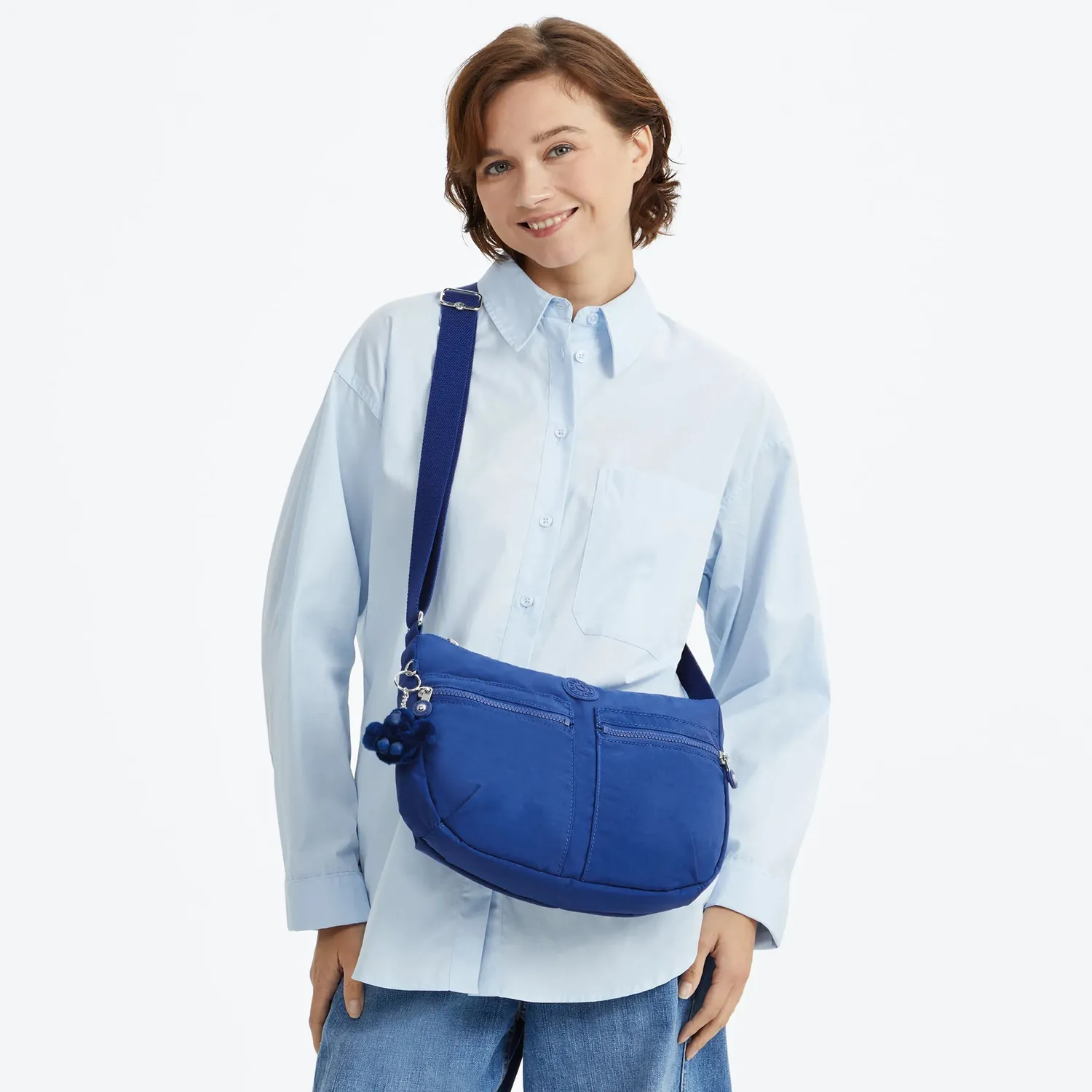 Kipling Izellah schoudertas Blazing Blue Medium waterafstotend