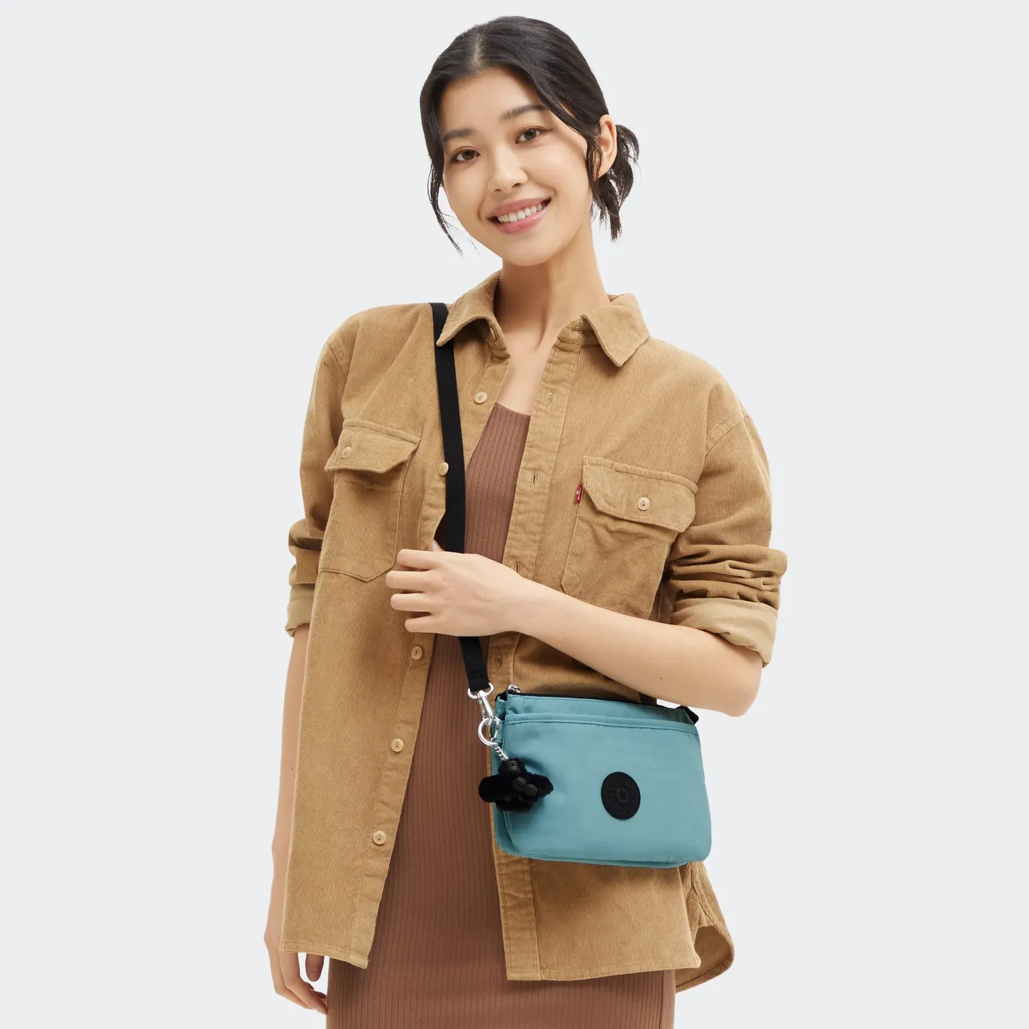 Kipling Riri crossbodytas klein muted sage waterafstotend