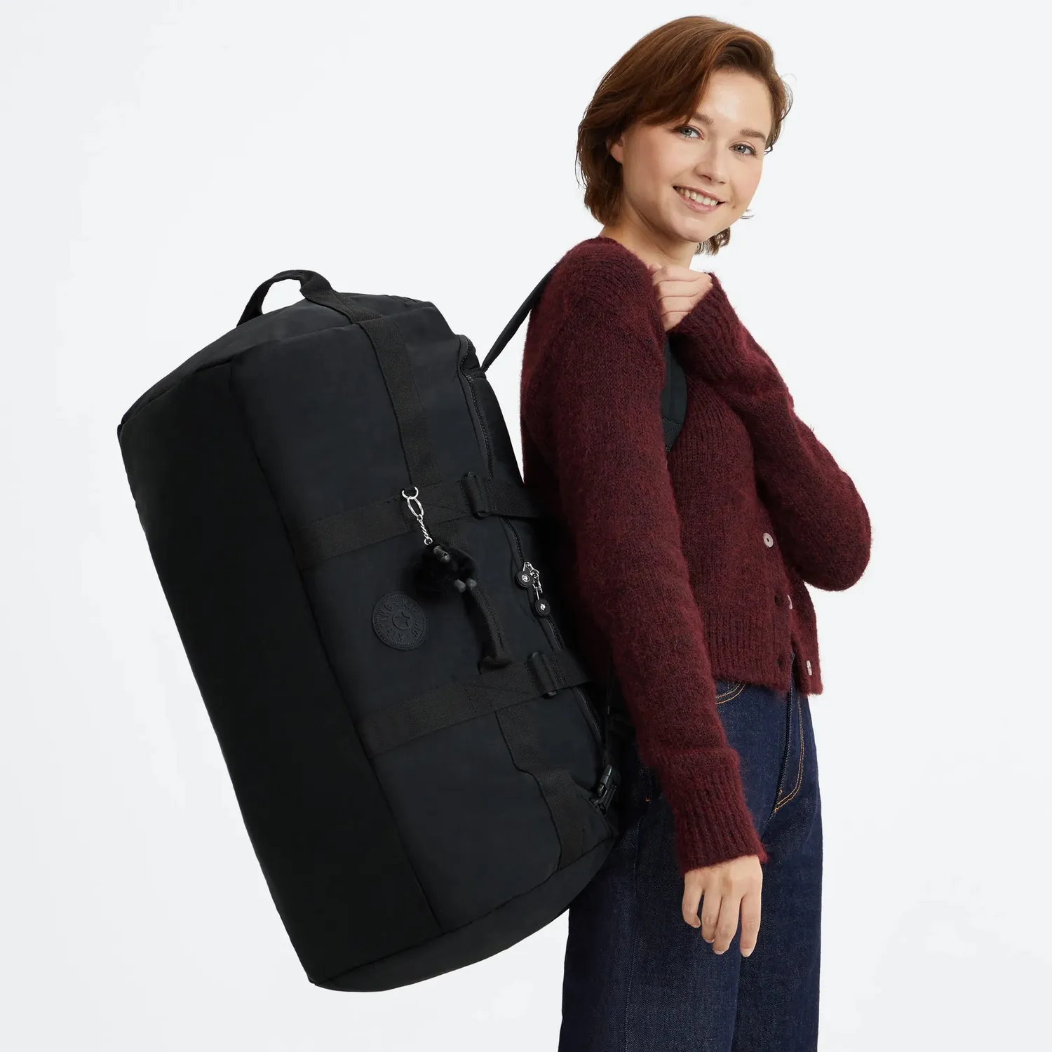 Kipling Donis M reistas Black Noir Medium met laptopvak