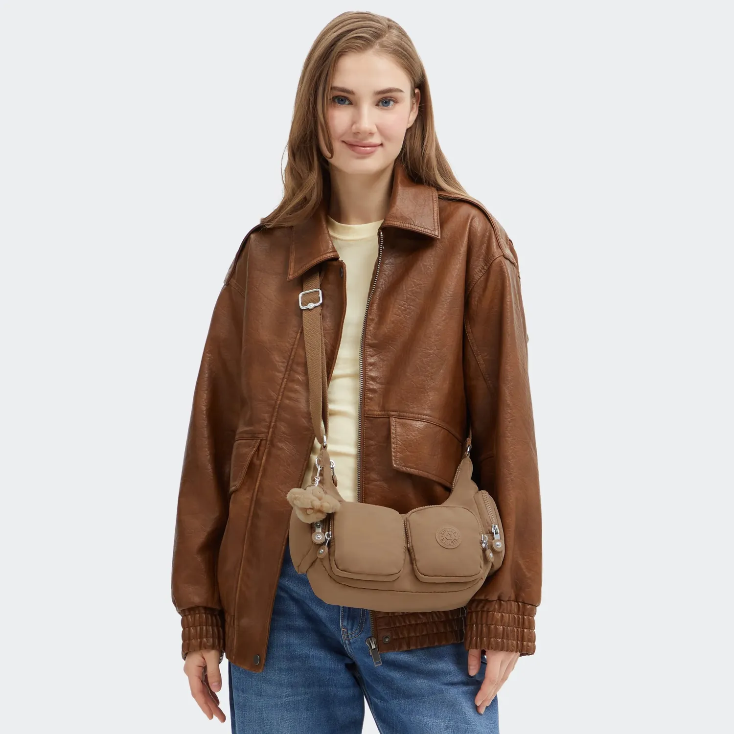Kipling Rikka S crossbodytas Klein Early Tan ritsvakken