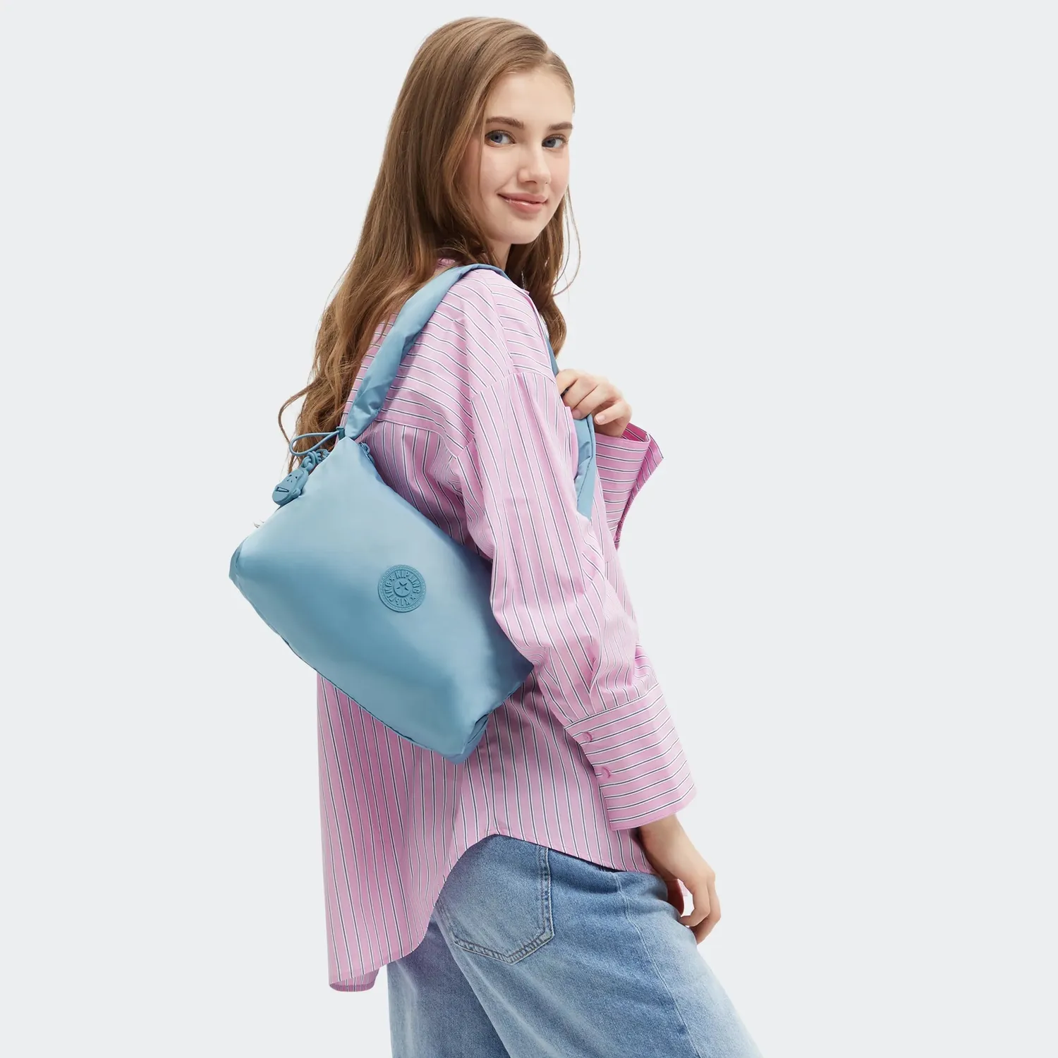 Kipling Eleni M schoudertas Sounds Blue medium blauw