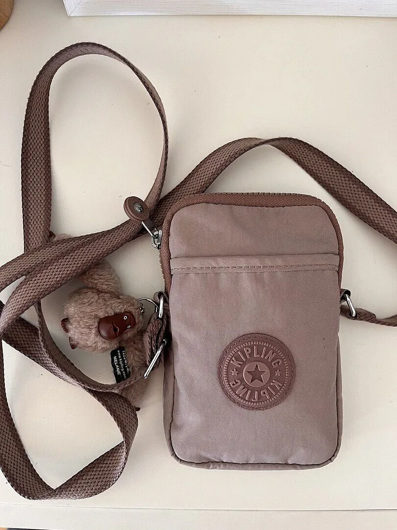 Kipling Tally telefoontas Klein Echo Embossed waterafstotend